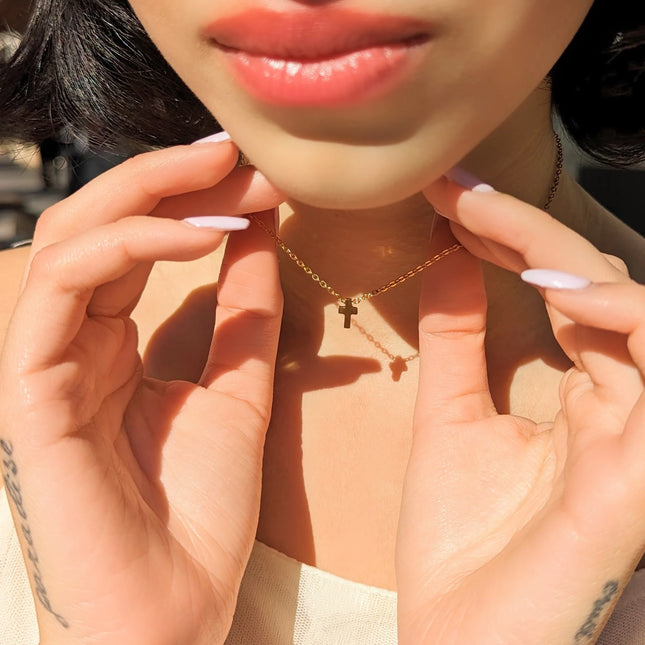 GOGO LUSH MINIMALIST CROSS NECKLACE ON MODEL