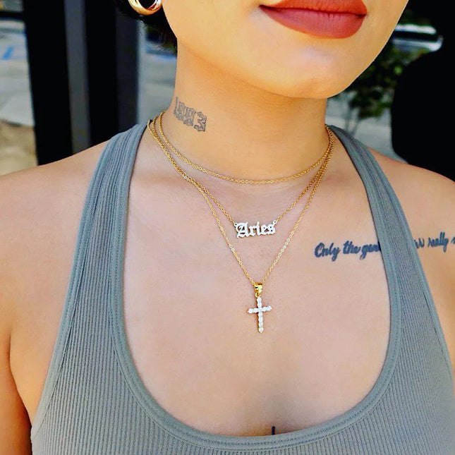 GOGO LUSH - MEDIUM CRYSTAL CROSS NECKLACE on neck